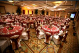 Grand ballroom set for a wedding reception and banquet.